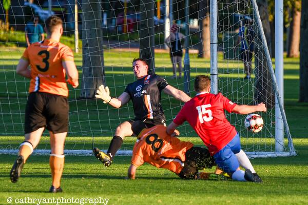 Action from Curtin University's 3-1 Night Series win over Dianella White Eagles. Photo by Cat Bryant Photography