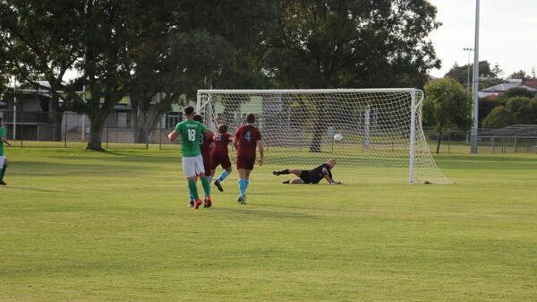 Action from Olympic Kingsway's 8-3 win at North Beach. Photo by North Beach SC/Facebook