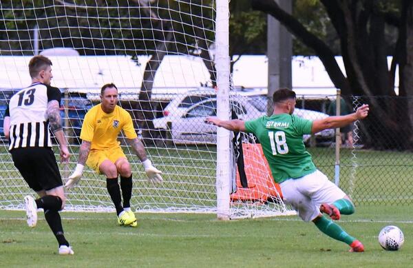 Asa Sippits about to shoot for Olympic Kingsway against Swan United. Photo by  Colin Feilen/Swan United
