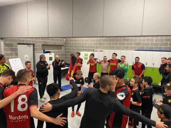 MUM FC players and coaching staff celebrate their win over Gosnells City. Photo from Murdoch University melville Facebook