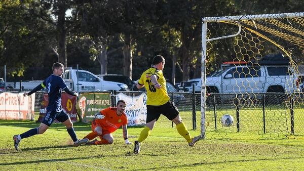 Dan Corbett scores for Forrestfield against Joondalup United. Photo by Cat Bryant
