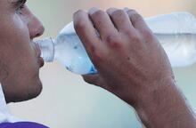 Man drinking from bottle