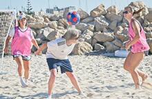 Football West beach football action shot