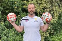 Ryan resumes glove affair with football